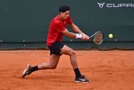 Cina plays a backhand in the Atkinson Monza Open 2025 - Source: Getty